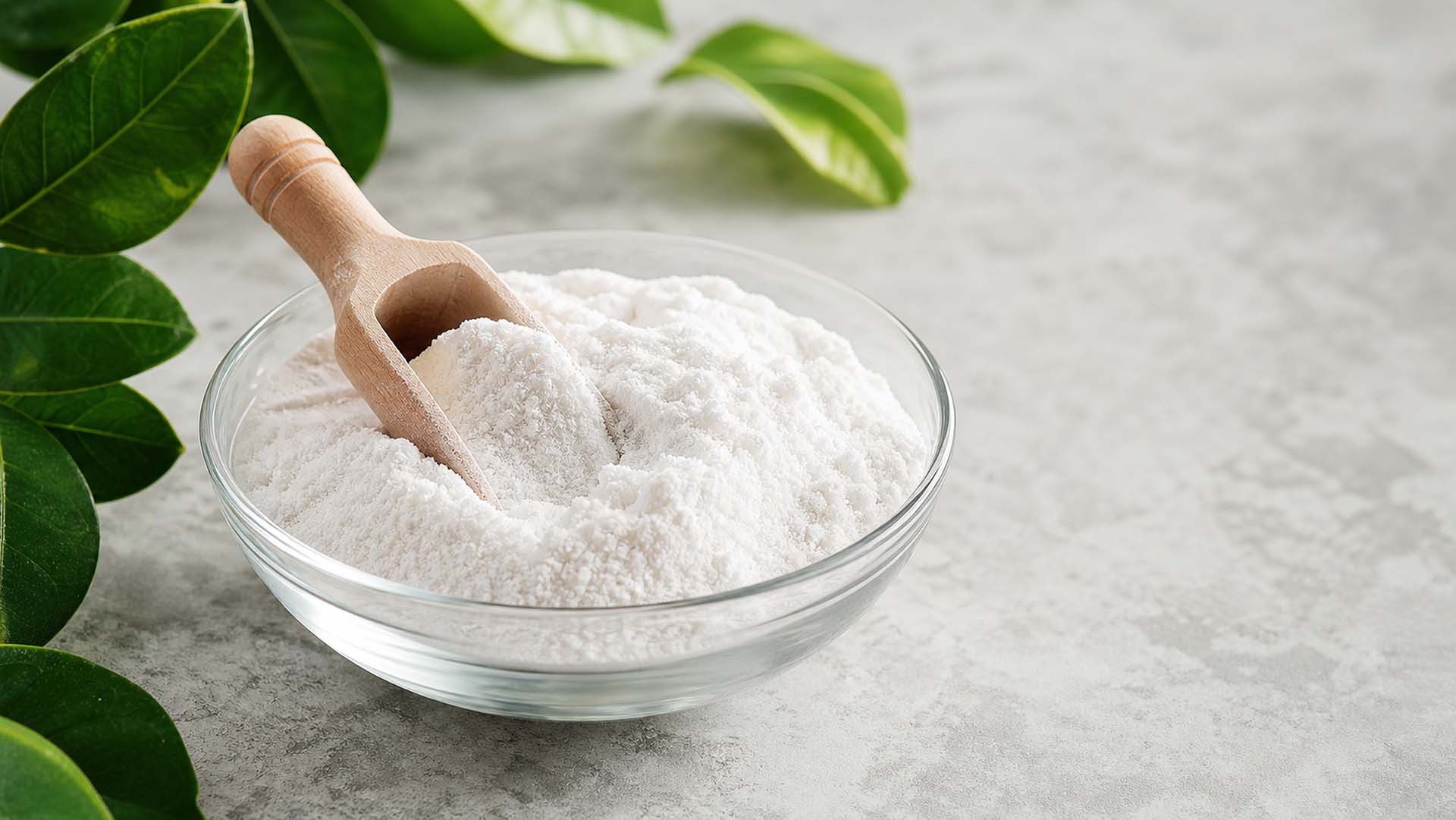 Food-grade soluble dietary fiber powder in a glass bowl